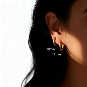 Polished S925 silver hoop earrings in 10mm and 12mm sizes with baroque hammered texture