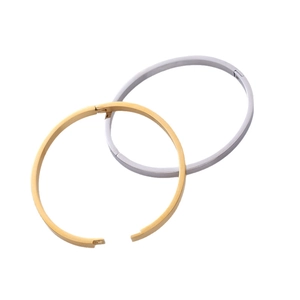 Minimalist stainless steel open bangles in gold and silver finish with hinged closure