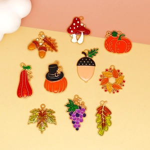 Detailed macro view of colorful autumn-themed alloy enamel charms for jewelry making