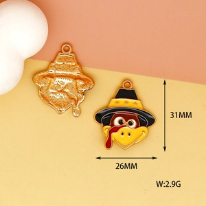Detail view of Thanksgiving turkey enamel charm with dimensions and gold back texture