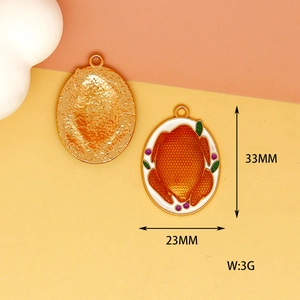 Detail view of the Thanksgiving turkey enamel pendant with dimensions 33mm x 23mm
