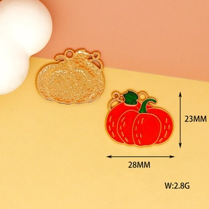 Detailed dimensions of red enamel pumpkin charm showing 28mm by 23mm size