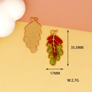 Detailed size guide for autumn leaf enamel pendant with dimensions and weight