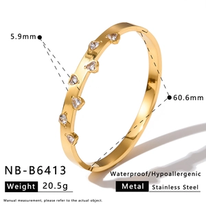 Gold stainless steel bangle with heart-shaped zircon details and dimensions