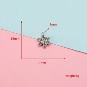 Detailed view of silver snowflake pendant showing 15mm height and 11mm width dimensions