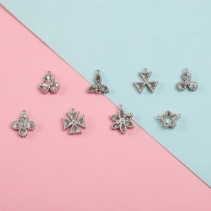 Assorted stainless steel geometric charms for DIY jewelry making and stone setting