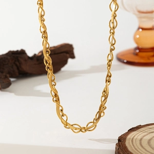 Handwoven gold titanium steel necklace with layered snake chain and textured link design