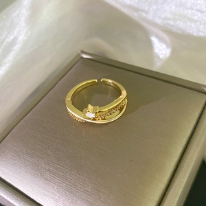 Elegant 18k gold plated double layer ring featuring a sparkling star and pavé zircon stones