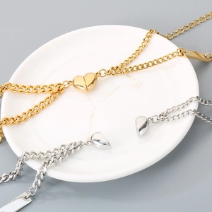 Magnetic heart-to-heart couple bracelets in gold and silver stainless steel with bar