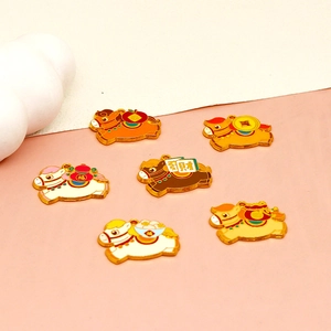 Close-up of colorful cartoon zodiac horse alloy enamel charms for DIY accessories