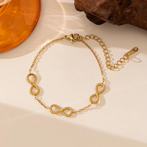 Elegant gold infinity symbol chain bracelet with twisted rope texture and lobster clasp