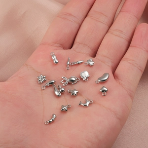 Variety of stainless steel charms including starfish dolphin and heart in palm for jewelry DIY