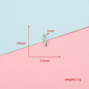 Detail showing dimensions of a tiny stainless steel carrot charm for DIY making