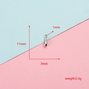 Macro view of small stainless steel bean pendant with 11mm height and weight specs