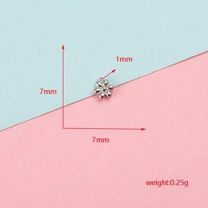 Detail view of 7mm stainless steel flower charm with dimension markings