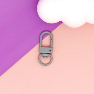 Macro view of a durable gray matte U-shaped swivel lobster clasp for DIY keychain accessories