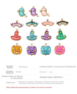 Collection of colorful Halloween enamel charms including ghosts, bats, hats, and pumpkins
