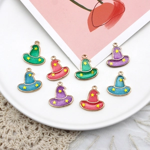 Detailed view of colorful Halloween witch hat charms with star patterns and glitter finish