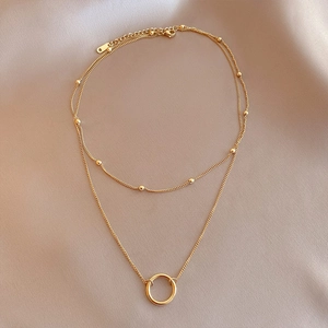 Double-layered 18K gold plated titanium steel necklace with beads and a circle pendant