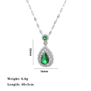 Detail view of pear-cut emerald pendant with micro-pave diamonds on 32x16mm silver chain