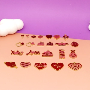 Close-up of mixed Valentine's Day heart alloy enamel charms in red and pink