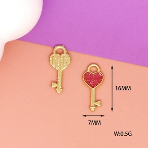 Detail view of heart-shaped key charms with 16mm length and 7mm width dimensions.