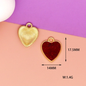 Detailed macro view of red glitter heart alloy pendant showing 17.5mm height and 14mm width