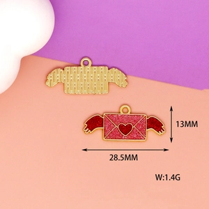 Close-up detail of red glitter heart envelope pendant showing 28.5mm by 13mm dimensions