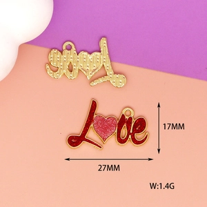 Detailed view of red glitter LOVE alloy pendant showing 27mm width and 1.4g weight