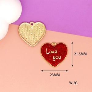 Detail view of red glitter heart charm with Love you text and 23mm dimension scale