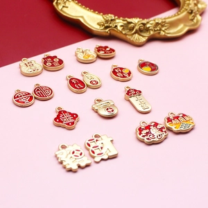 Macro detail of various Chinese style alloy enamel charms for DIY jewelry making crafts.
