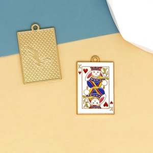 Macro view showing front and back details of rabbit King of Hearts enamel playing card pendant.