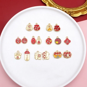 Detail view of festive Chinese style alloy enamel charms for DIY jewelry making