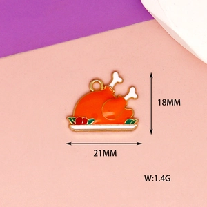 Detail of Thanksgiving turkey enamel pendant showing 21x18mm dimensions and 1.4g weight