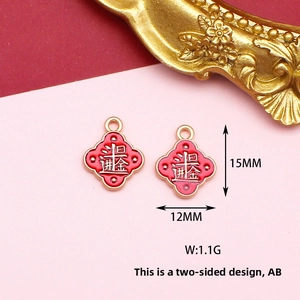 Detail view of lucky Chinese style red enamel charms showing size and weight specifications.