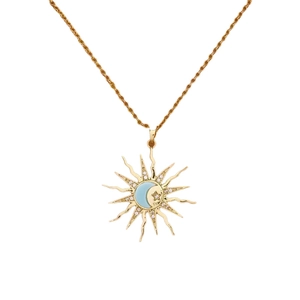 Golden sun pendant necklace with blue moon and star charms on a white background