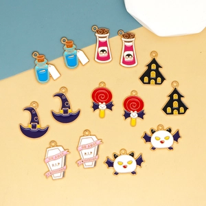 Detailed view of mixed Halloween theme alloy drip oil charms for DIY jewelry making