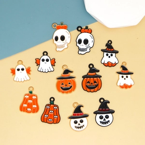 Detail showing various Halloween enamel charms including ghosts, pumpkins and skulls.