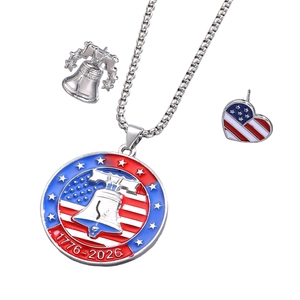 Detailed view of 250th US Anniversary Liberty Bell pendant and flag pins jewelry set