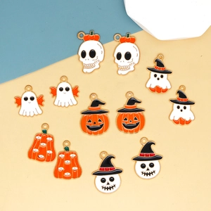 Detail view of assorted Halloween alloy enamel charms featuring pumpkin ghost and skull designs
