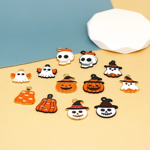Assorted Halloween enamel charms including pumpkins and ghosts for DIY jewelry making