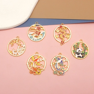 Detailed view of Chinese-style enamel alloy pendants featuring dragon and panda motifs