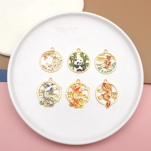Detail of Chinese style enamel alloy pendants featuring dragon, phoenix and panda motifs