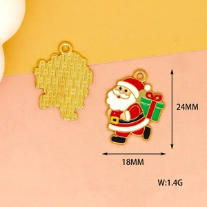 Detalle del colgante de Papá Noel en aleación con dimensiones 24x18mm y peso de 1,4g indicado.
