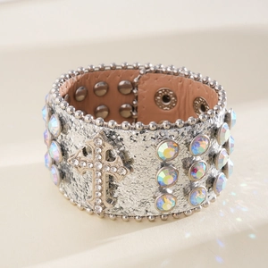 Detailed view of silver glitter leather bracelet with rhinestone cross and colorful stones