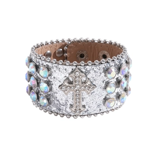 Silver leather cuff bracelet with a crystal-encrusted cross and iridescent rhinestones