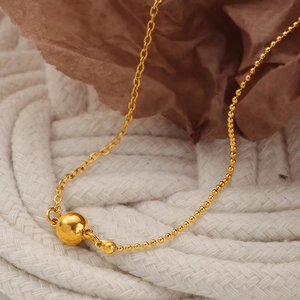 18K gold plated titanium steel anklet featuring small beads and asymmetric chain links