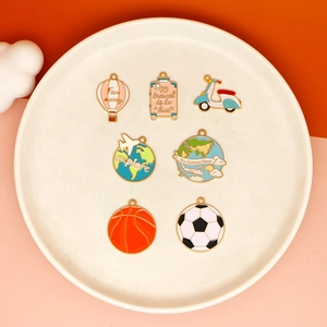 Travel themed DIY alloy pendants including earth airplane and hot air balloon designs