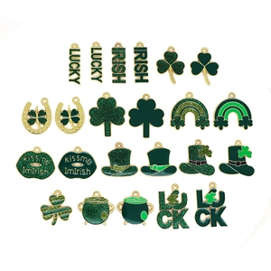 Assorted St. Patrick's Day green enamel charms featuring lucky clovers and festive hats