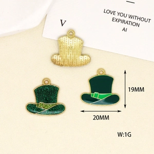 Detailed macro view of green enamel hat charms for St. Patrick's Day DIY jewelry making.